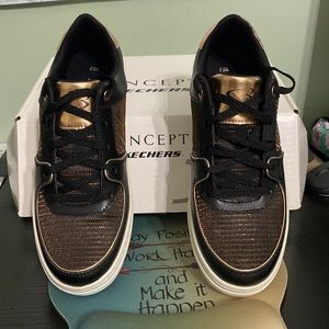 Concept three by Skechers. Size 8 1/2. New never worn. Black rose gold.